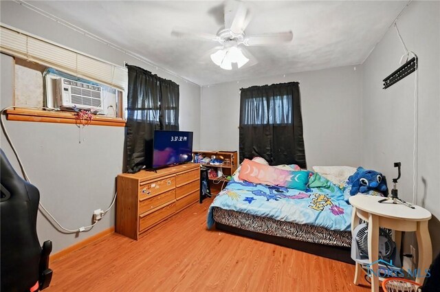 284 E Findlay St, Sugar Creek Township, OH 45893 - bedroom with cooling unit, wood finished floors, and ceiling fan