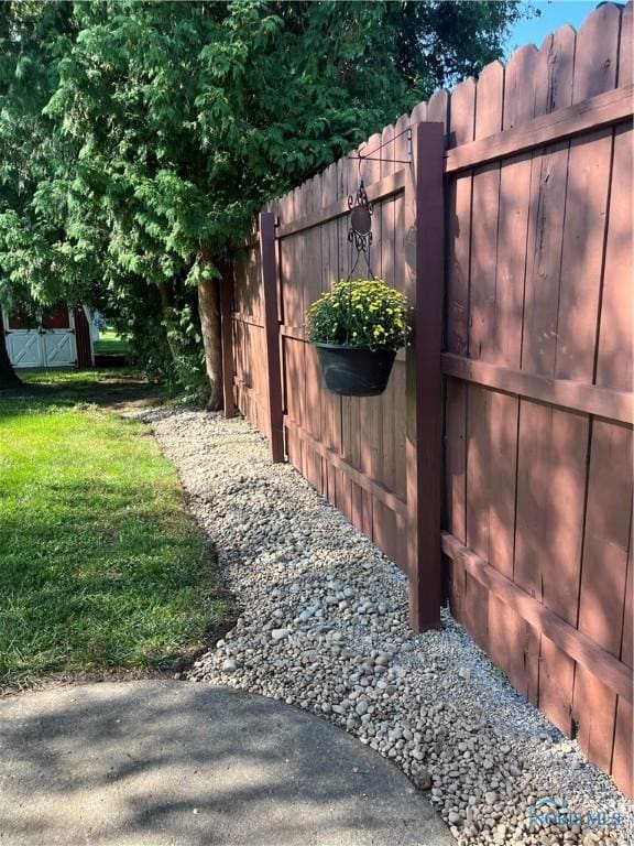 view of yard with a gate and fence
