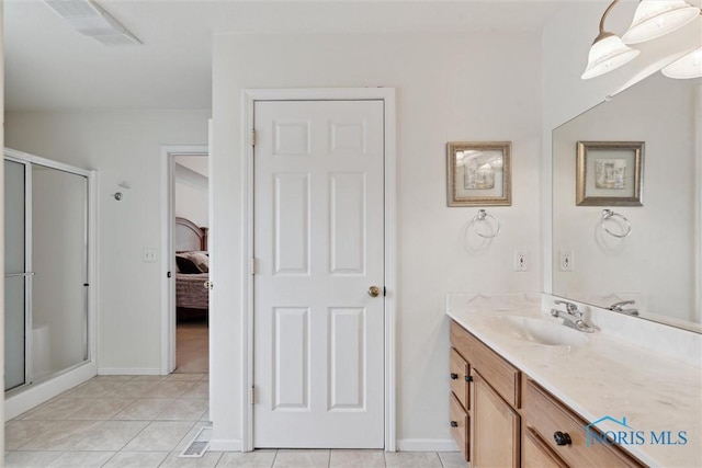 2016 Austin Bluffs Ct, Toledo, OH 43615 - ensuite bathroom with a shower stall, tile patterned floors, vanity, and visible vents