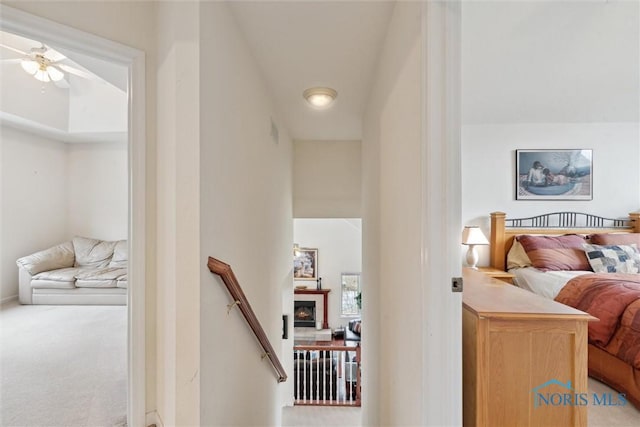 2016 Austin Bluffs Ct, Toledo, OH 43615 - interior space featuring visible vents, carpet flooring, and an upstairs landing