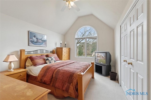 2016 Austin Bluffs Ct, Toledo, OH 43615 - bedroom with ceiling fan, light carpet, and lofted ceiling