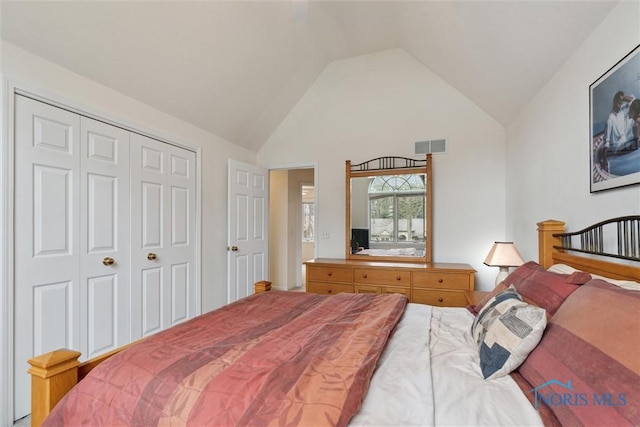 2016 Austin Bluffs Ct, Toledo, OH 43615 - bedroom with a closet, visible vents, and vaulted ceiling