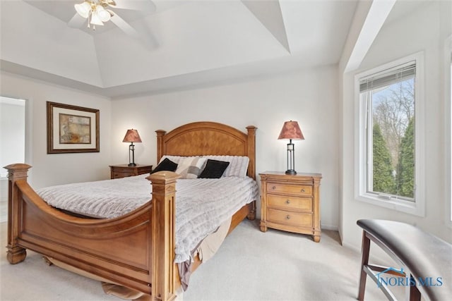 2016 Austin Bluffs Ct, Toledo, OH 43615 - bedroom with ceiling fan, a raised ceiling, light colored carpet, and baseboards