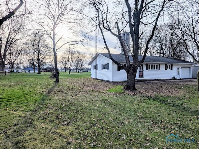 view of yard with a garage