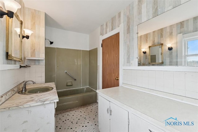 bathroom with vanity and shower / bath combination