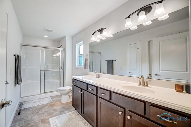 630 Weatherby Ct, Findlay, OH 45840 - full bath featuring a stall shower, double vanity, and a sink