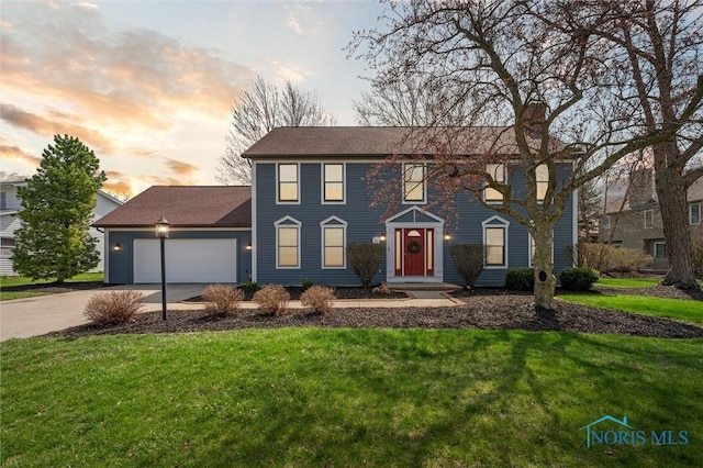 3011 Heather Downs Dr, Findlay, OH 45840 - colonial-style house featuring driveway, a lawn, a garage, and a chimney
