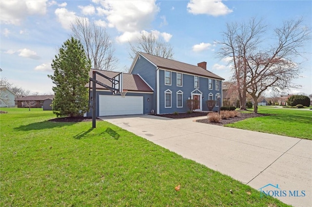 3011 Heather Downs Dr, Findlay, OH 45840 - colonial-style house featuring a front yard, driveway, a garage, and a chimney