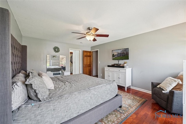 3011 Heather Downs Dr, Findlay, OH 45840 - bedroom featuring wood finished floors, ceiling fan, baseboards, and a walk in closet