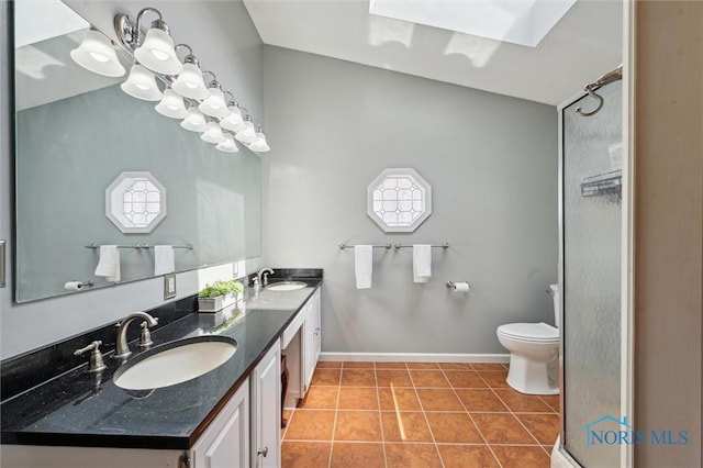 3011 Heather Downs Dr, Findlay, OH 45840 - full bathroom featuring toilet, tile patterned floors, double vanity, and a sink