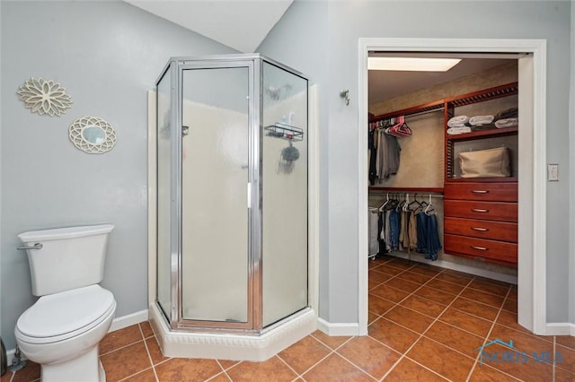 3011 Heather Downs Dr, Findlay, OH 45840 - bathroom featuring a walk in closet, tile patterned floors, and a shower stall