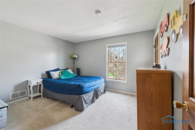 3011 Heather Downs Dr, Findlay, OH 45840 - bedroom featuring visible vents, baseboards, carpet, and a textured ceiling