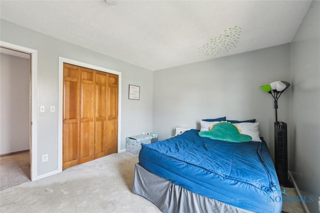 3011 Heather Downs Dr, Findlay, OH 45840 - carpeted bedroom featuring a closet and baseboards