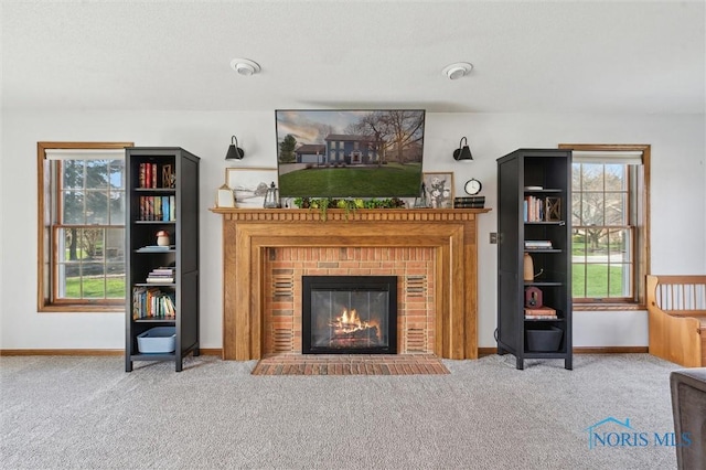 3011 Heather Downs Dr, Findlay, OH 45840 - living room featuring carpet floors, baseboards, and a brick fireplace