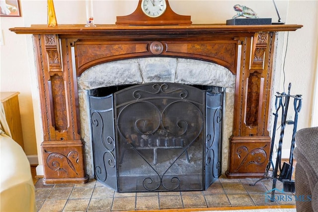 interior details featuring a fireplace