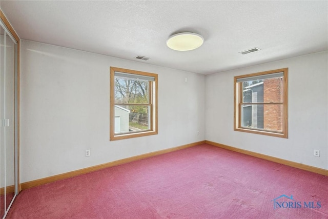 371 Canal Rd, Waterville, OH 43566 - carpeted spare room with visible vents, baseboards, and a textured ceiling