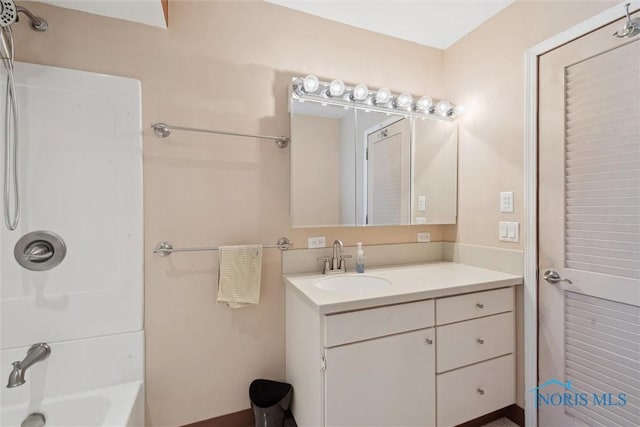 371 Canal Rd, Waterville, OH 43566 - bathroom featuring washtub / shower combination and vanity