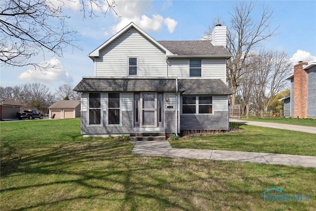 371 Canal Rd, Waterville, OH 43566 - view of front of home with roof with shingles, a front lawn, and a chimney