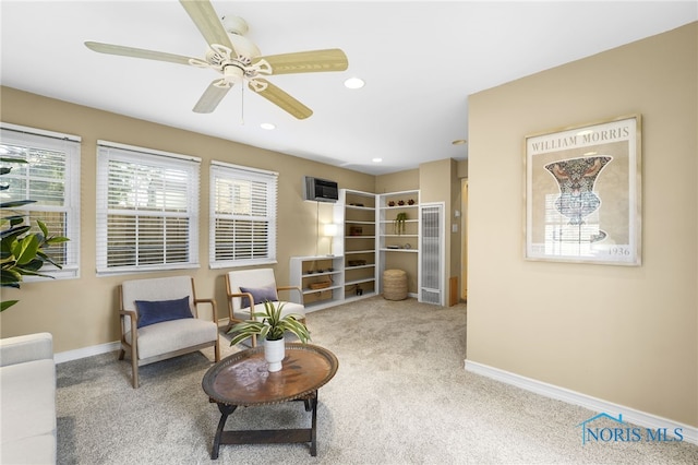 living area with baseboards, carpet flooring, ceiling fan, and recessed lighting