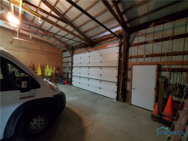 garage featuring metal wall