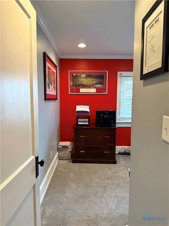 corridor with recessed lighting, crown molding, carpet, and baseboards