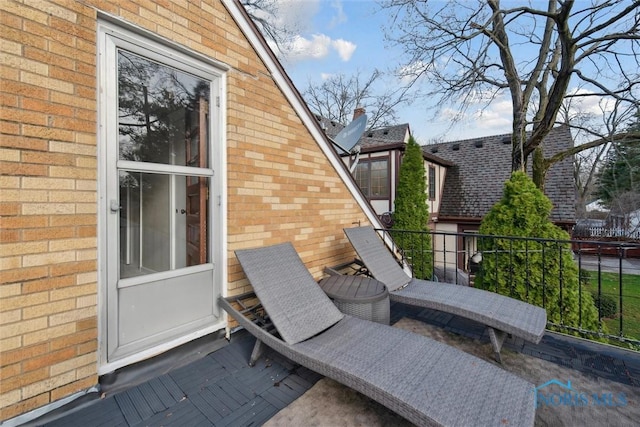 view of patio / terrace with a balcony