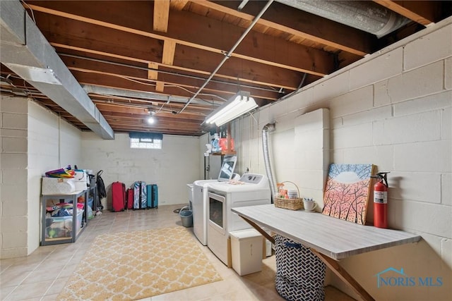 basement featuring washer and clothes dryer