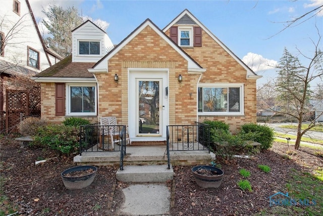view of front facade featuring brick siding