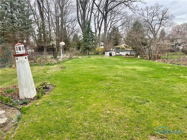view of yard featuring fence
