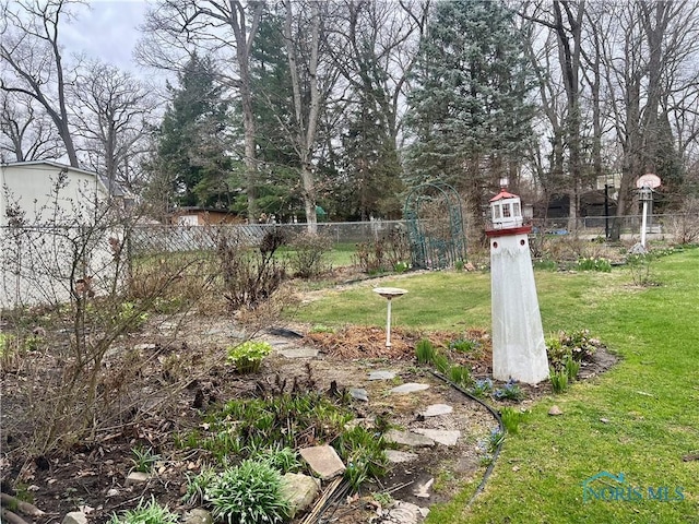 view of yard featuring fence