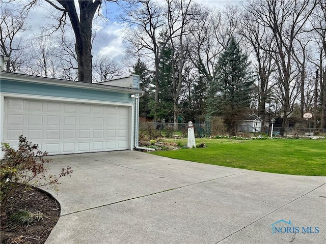 garage featuring fence