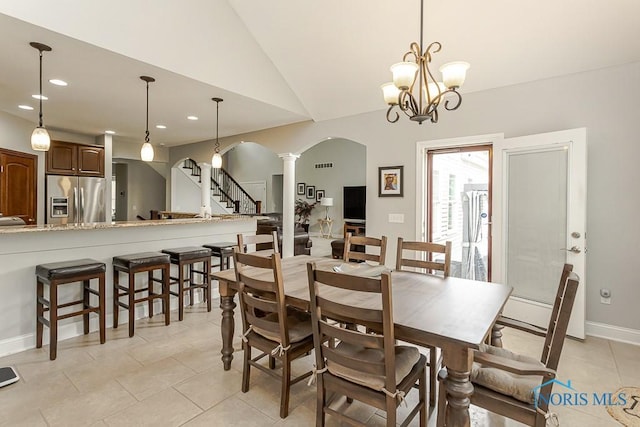 3643 Boulder Ridge Dr, Maumee, OH 43537 - dining area featuring arched walkways, light tile patterned flooring, recessed lighting, ornate columns, and lofted ceiling