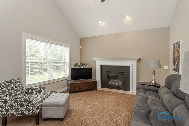 3643 Boulder Ridge Dr, Maumee, OH 43537 - living room featuring carpet floors, a tile fireplace, and high vaulted ceiling