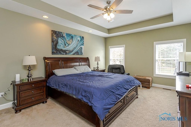 3643 Boulder Ridge Dr, Maumee, OH 43537 - bedroom with visible vents, light carpet, baseboards, and a tray ceiling