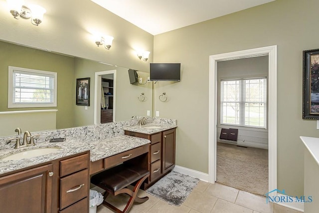3643 Boulder Ridge Dr, Maumee, OH 43537 - bathroom featuring baseboards, vanity, and tile patterned floors