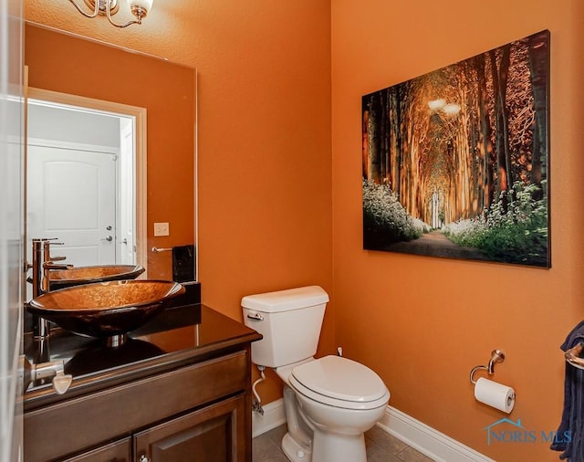 3643 Boulder Ridge Dr, Maumee, OH 43537 - bathroom featuring toilet, vanity, tile patterned floors, and baseboards