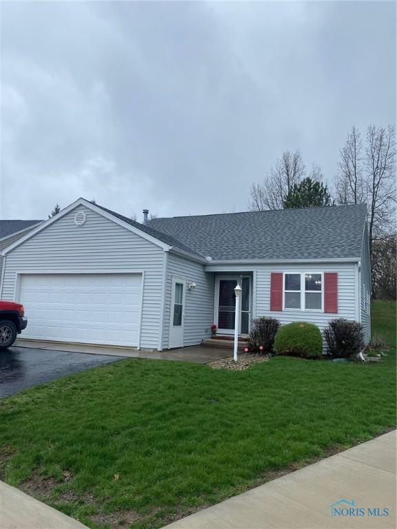 1308 Countryside Dr Unit B9, Findlay, OH 45840 - ranch-style home featuring a garage, aphalt driveway, roof with shingles, and a front yard