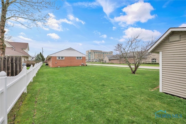 view of yard featuring fence
