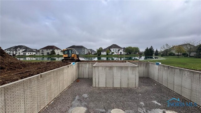 9224 Summer Song Ln, Sylvania, OH 43560 - exterior space with a fenced backyard, a water view, and a residential view