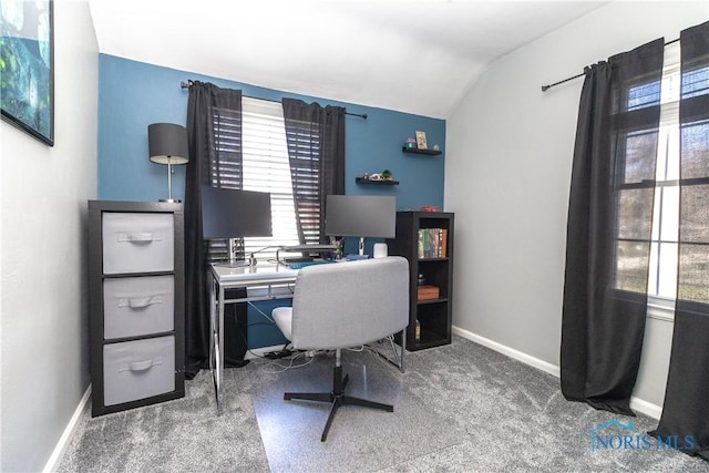 office featuring baseboards, carpet, and vaulted ceiling