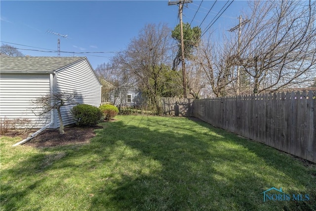 view of yard featuring fence