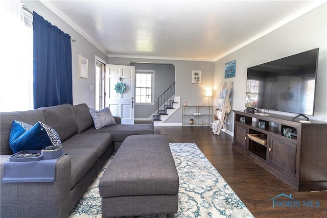 living area featuring stairs, dark wood-style floors, and baseboards