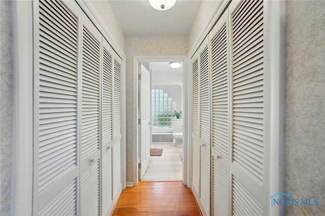 2257 N Carriage Ln, Port Clinton, OH 43452 - corridor with light wood-type flooring