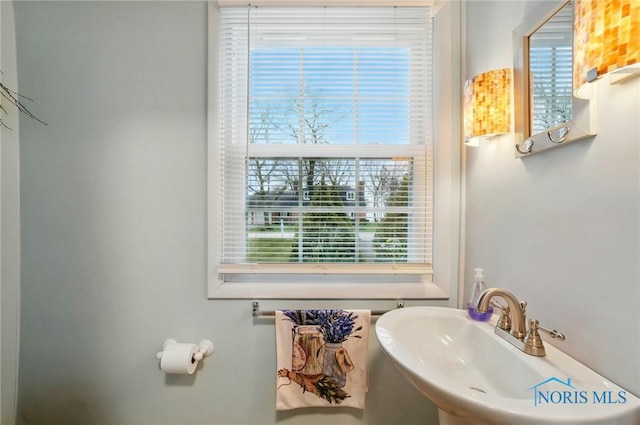 2257 N Carriage Ln, Port Clinton, OH 43452 - bathroom with a sink and a wealth of natural light