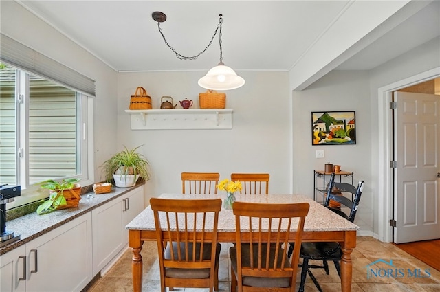 2257 N Carriage Ln, Port Clinton, OH 43452 - dining space featuring ornamental molding