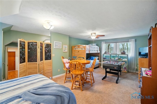 2257 N Carriage Ln, Port Clinton, OH 43452 - carpeted bedroom featuring baseboards and a ceiling fan