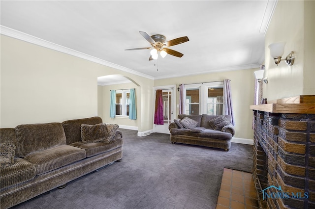 2720 106th St, Toledo, OH 43611 - living room with a healthy amount of sunlight, arched walkways, crown molding, and ceiling fan
