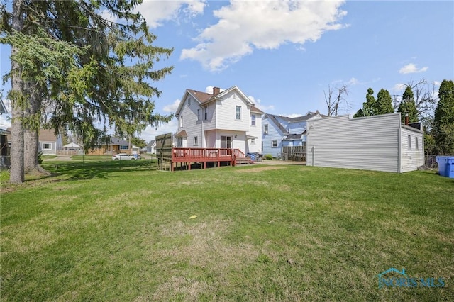 2720 106th St, Toledo, OH 43611 - view of yard with a wooden deck