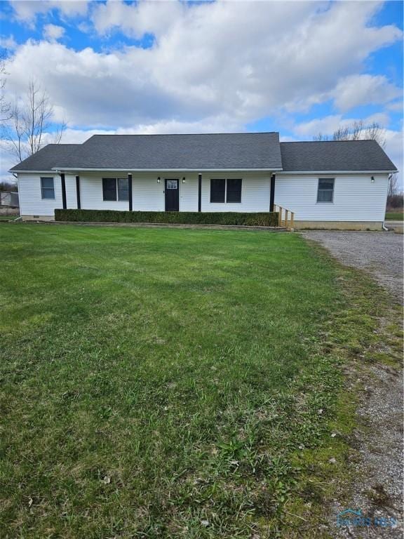 10308 Dowling Rd, Perrysburg, OH 43551 - single story home with a front yard and gravel driveway
