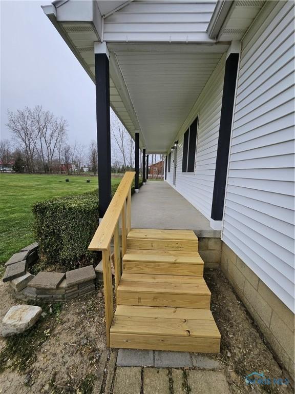10308 Dowling Rd, Perrysburg, OH 43551 - porch with a yard